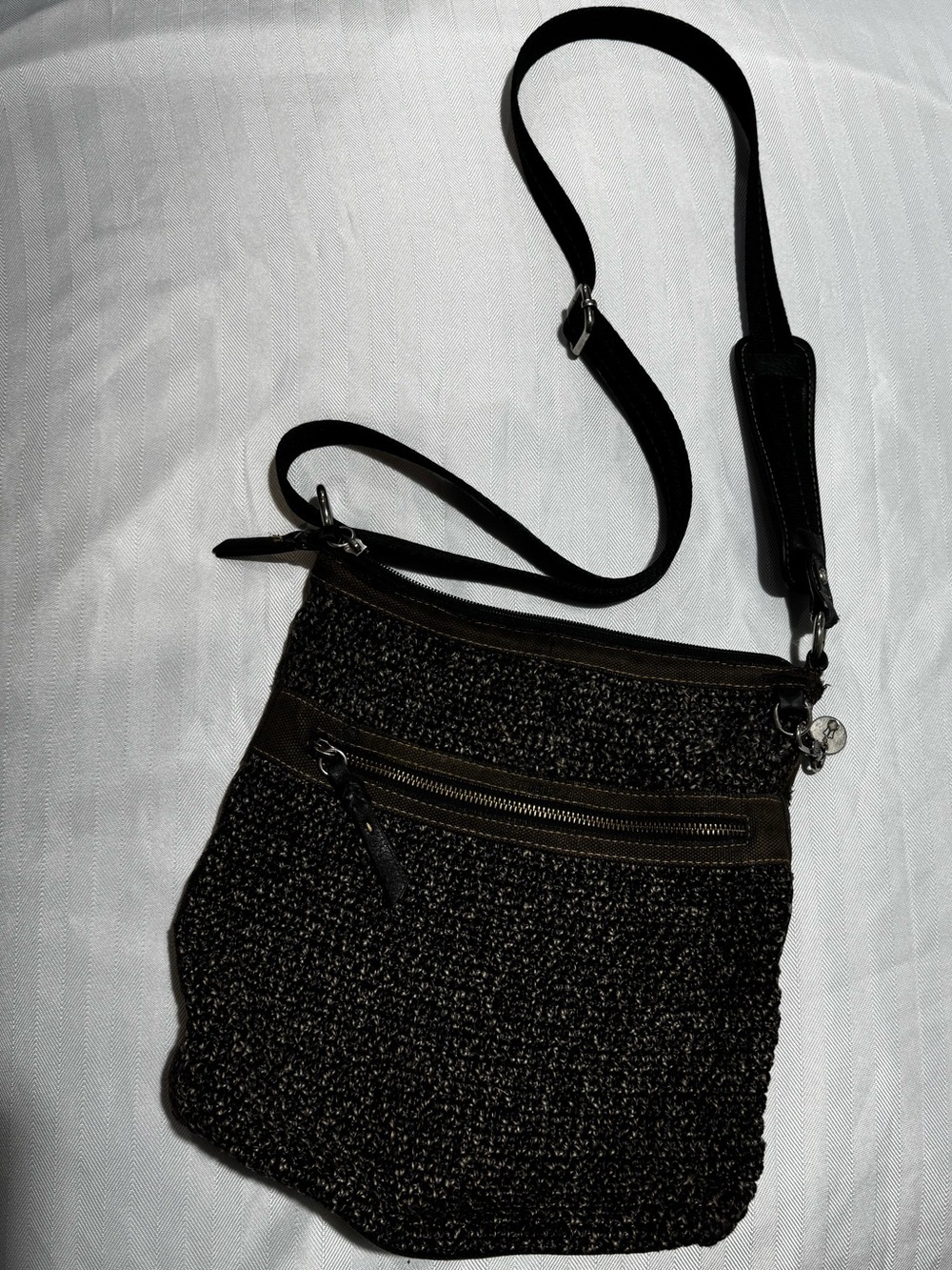 The Sak Black Woven Crossbody Bag with Adjustable Strap